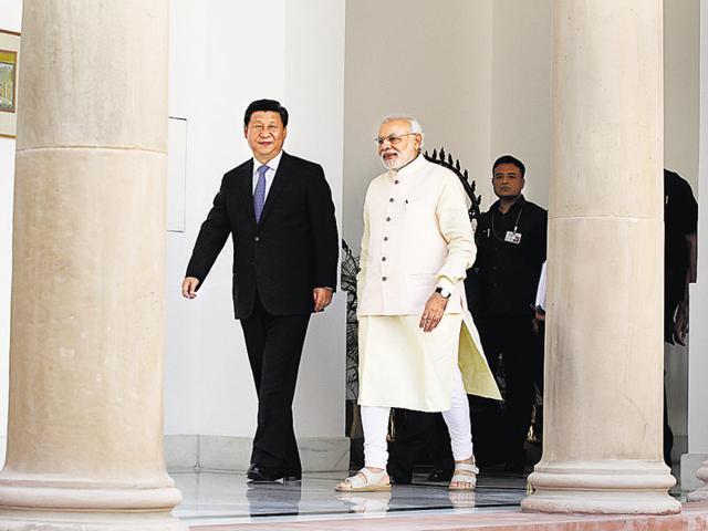 File photo of China's President Xi Jinping and Prime Minister Narendra Modi sharing a quiet moment at Sabarmati Ashram in Ahmedabad. (AFP) File photo of China's President Xi Jinping and Prime Minister Narendra Modi sharing a quiet moment at Sabarmati Ashram in Ahmedabad. (AFP)