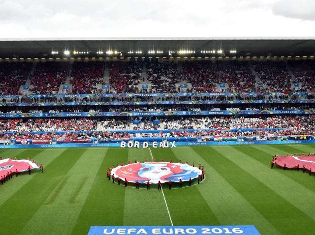 Volunteers display the Hungary and Austria shirts (corners) before the start of the Euro 2016 group F football match between Hungary and Austria at the Matmut Atlantique stadium in Bordeaux. (AFP Photo) Volunteers display the Hungary and Austria shirts (corners) before the start of the Euro 2016 group F football match between Hungary and Austria at the Matmut Atlantique stadium in Bordeaux. (AFP Photo)