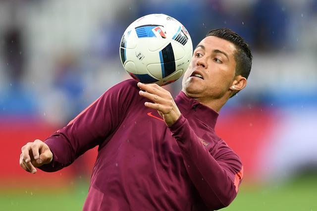 Portugal's forward Cristiano Ronaldo warms-up prior to the start of the Euro 2016 group F football match against Iceland. (AFP Photo) Portugal's forward Cristiano Ronaldo warms-up prior to the start of the Euro 2016 group F football match against Iceland. (AFP Photo)