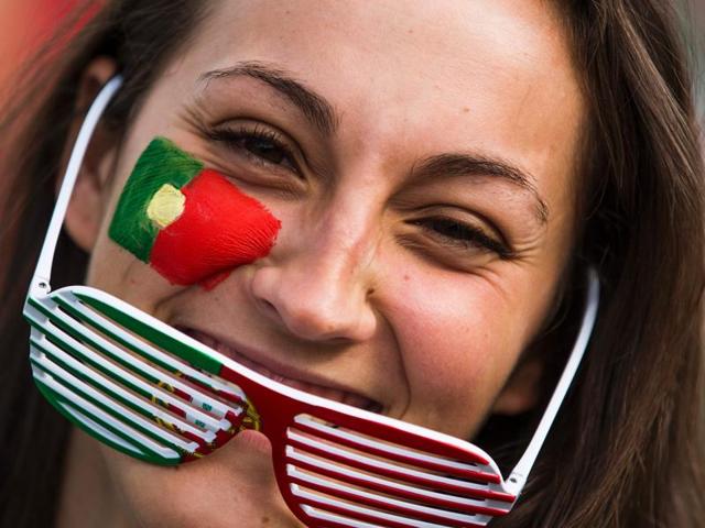 A Portugal fan waits to enter the Geoffroy-Guichard stadium in Saint-Etienne. (AFP Photo) A Portugal fan waits to enter the Geoffroy-Guichard stadium in Saint-Etienne. (AFP Photo)