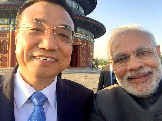 Prime Minister Narendra Modi with Chinese Premier Li Keqiang pose for a selfie at the Temple of Heaven in Beijing. (PMO India Twitter account) Prime Minister Narendra Modi with Chinese Premier Li Keqiang pose for a selfie at the Temple of Heaven in Beijing. (PMO India Twitter account)