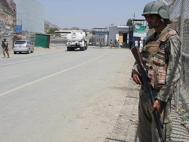 Pakistani soldiers patrol at the Torkham crossing between Pakistan and Afghanistan in Pakistan's Khyber Agency on June 14, 2016. Afghan and Pakistani forces clashed in an escalation of tensions between the neighbouring countries, killing at least three people and forcing the closure of the main border crossing, officials said. (AFP) Pakistani soldiers patrol at the Torkham crossing between Pakistan and Afghanistan in Pakistan's Khyber Agency on June 14, 2016. Afghan and Pakistani forces clashed in an escalation of tensions between the neighbouring countries, killing at least three people and forcing the closure of the main border crossing, officials said. (AFP)