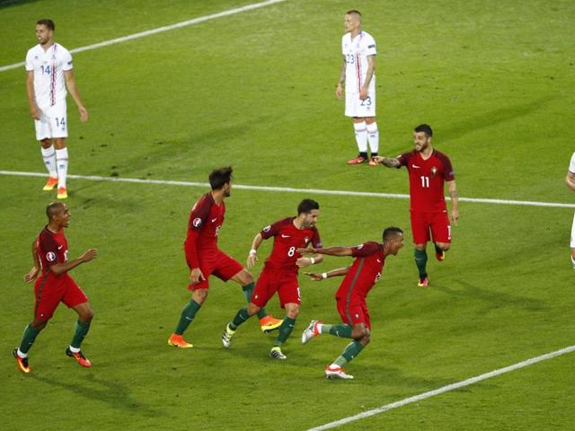 Portugal’s players join Nani to celebrate his goal. (REUTERS) Portugal’s players join Nani to celebrate his goal. (REUTERS)