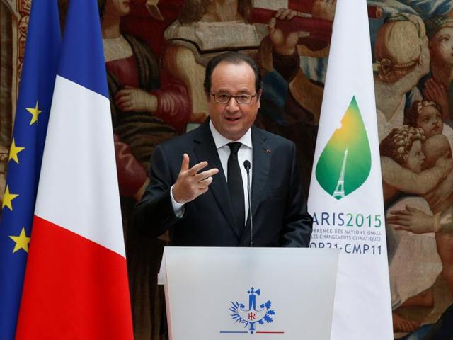French President Francois Hollande delivers a speech during the ratification ceremony for the World Climate Change Conference 2015 (COP21) at the Elysee Palace in Paris. (REUTERS) French President Francois Hollande delivers a speech during the ratification ceremony for the World Climate Change Conference 2015 (COP21) at the Elysee Palace in Paris. (REUTERS)