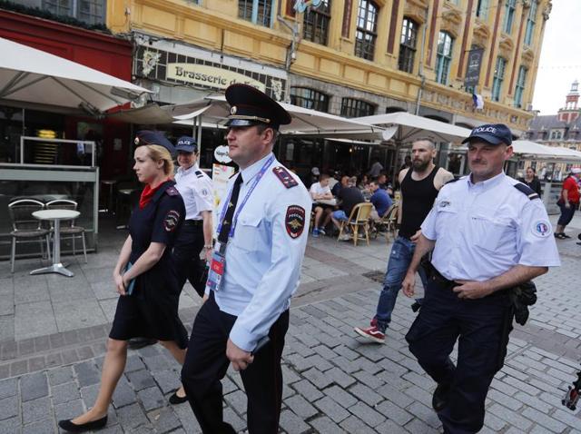 Russian police officers walk through a square in downtown Lille, after being called into to bolster security ahead of the Euro 2016 Group B football match between Russia and Slovakia at the Pierre Mauroy stadium in Villeneuve d’Ascq, near Lille. (AP Photo) Russian police officers walk through a square in downtown Lille, after being called into to bolster security ahead of the Euro 2016 Group B football match between Russia and Slovakia at the Pierre Mauroy stadium in Villeneuve d’Ascq, near Lille. (AP Photo)