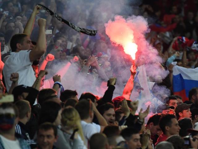Russia supporters celebrate after Russia's Denis Glushakov scored their first goal during the Euro 2016 Group B football match between Russia and Slovakia at the Pierre Mauroy stadium in Villeneuve d’Ascq, near Lille. (AP Photo) Russia supporters celebrate after Russia's Denis Glushakov scored their first goal during the Euro 2016 Group B football match between Russia and Slovakia at the Pierre Mauroy stadium in Villeneuve d’Ascq, near Lille. (AP Photo)