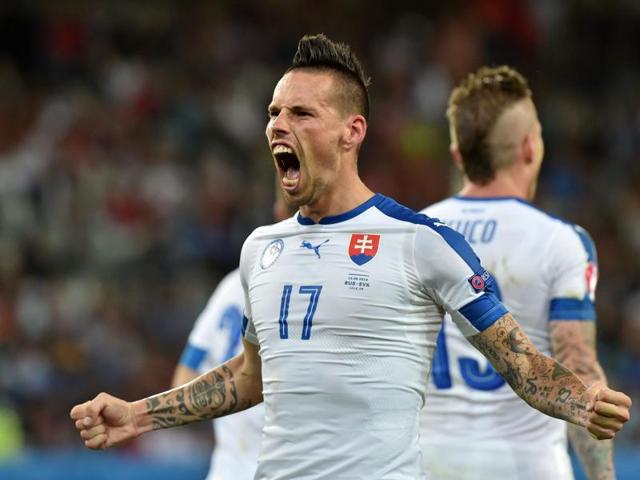 Slovakia's midfielder Marek Hamsik celebrates his goal during the Euro 2016 group B football match between Russia and Slovakia at the Pierre-Mauroy Stadium in Villeneuve-d'Ascq, near Lille. (AFP Photo) Slovakia's midfielder Marek Hamsik celebrates his goal during the Euro 2016 group B football match between Russia and Slovakia at the Pierre-Mauroy Stadium in Villeneuve-d'Ascq, near Lille. (AFP Photo)