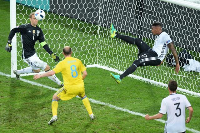 Jerome Boateng (2ndR) fell backwards in a last-ditch attempt to save what looked like a certain goal for Ukraine. (AFP)