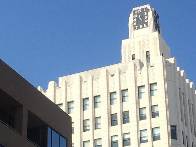 Pedestrians cross traffic on Hollywood Boulevard at dusk. The road serves as a theater district and is a major tourist attraction.(Getty Images)