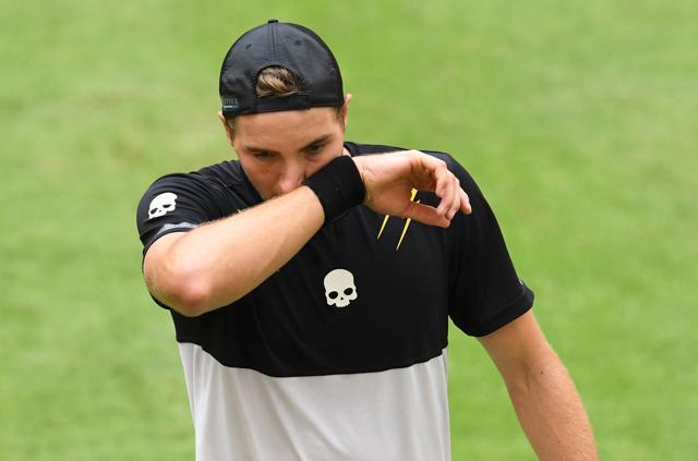 Jan-Lennard Struff from Germany reacts during the match against Roger Federer from Switzerland during the ATP Tournament in Halle, western Germany. (AFP Photo) Jan-Lennard Struff from Germany reacts during the match against Roger Federer from Switzerland during the ATP Tournament in Halle, western Germany. (AFP Photo)