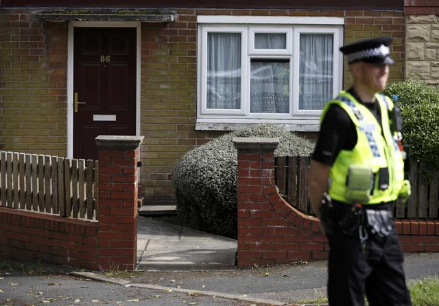 A police officer stands outside the home of a man who was arrested after Labour MP Jo Cox was attacked in her constituency near Leeds. (REUTERS) A police officer stands outside the home of a man who was arrested after Labour MP Jo Cox was attacked in her constituency near Leeds. (REUTERS)