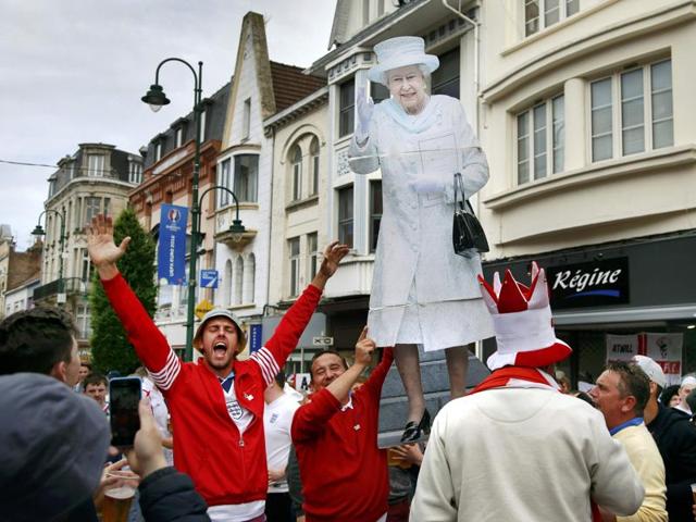 England fans with Queen Elizabeth’s cutout near Lens stadium before the England vs Wales game. (Reuters Photo) 