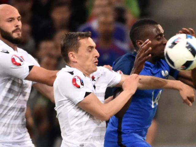 Albania's midfielder Ermir Lenjani (L) and France's midfielder N'Golo Kante (C) vie for the ball during the Euro 2016 group A football match between France and Albania at the Velodrome stadium in Marseille on Wednesday. (AFP) Albania's midfielder Ermir Lenjani (L) and France's midfielder N'Golo Kante (C) vie for the ball during the Euro 2016 group A football match between France and Albania at the Velodrome stadium in Marseille on Wednesday. (AFP)
