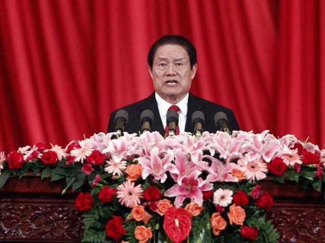 File photo from May 2012 shows then-Politburo standing committee member Zhou Yongkang delivering a speech at a meeting in Beijing. China has jailed the son of its former security chief for 18 years and his wife for nine, state media reported. Zhou Yongkang is the highest official to be sentenced in a sweeping anti-graft campaign championed by President Xi Jinping. (AFP) File photo from May 2012 shows then-Politburo standing committee member Zhou Yongkang delivering a speech at a meeting in Beijing. China has jailed the son of its former security chief for 18 years and his wife for nine, state media reported. Zhou Yongkang is the highest official to be sentenced in a sweeping anti-graft campaign championed by President Xi Jinping. (AFP)