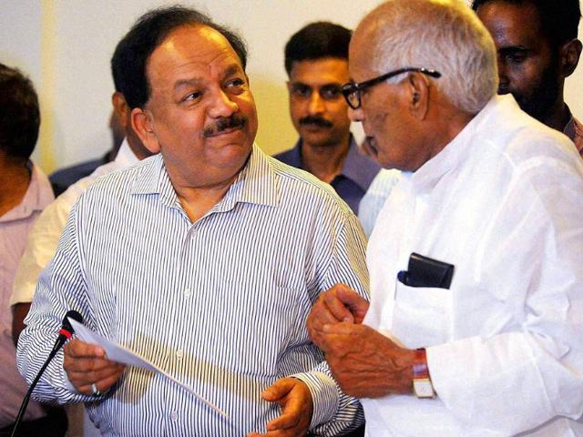 File photo of science and technology minister Harsh Vardhan talking to Bihar health minister Ramdhani Singh. (PTI Photo) File photo of science and technology minister Harsh Vardhan talking to Bihar health minister Ramdhani Singh. (PTI Photo)