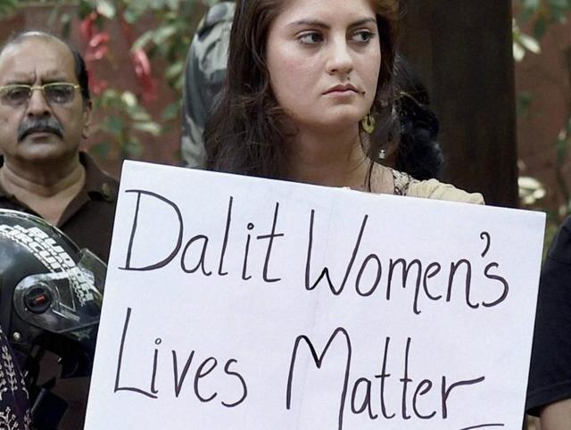 Activists demand justice for the Dalit woman who was brutally raped and murdered at her home on April 28 in Kerala. (PTI File Photo) Activists demand justice for the Dalit woman who was brutally raped and murdered at her home on April 28 in Kerala. (PTI File Photo)