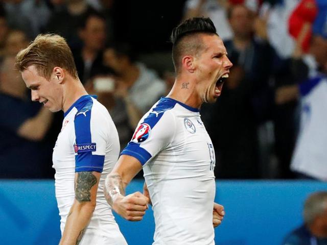 Slovakia's midfielder Marek Hamsik celebrates his goal, his team's second goal, during the Euro 2016 group B football match between Russia and Slovakia at the Pierre-Mauroy Stadium in Villeneuve-d'Ascq, near Lille, on June 15, 2016. (AFP) Slovakia's midfielder Marek Hamsik celebrates his goal, his team's second goal, during the Euro 2016 group B football match between Russia and Slovakia at the Pierre-Mauroy Stadium in Villeneuve-d'Ascq, near Lille, on June 15, 2016. (AFP)