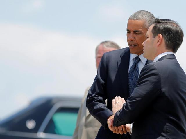 US President Barack Obama shakes hands with US Senator Marco Rubio (R-FL) as he arrives in Orlando to meet with families of victims of the Pulse nightclub shooting, in Florida, US. (REUTERS) US President Barack Obama shakes hands with US Senator Marco Rubio (R-FL) as he arrives in Orlando to meet with families of victims of the Pulse nightclub shooting, in Florida, US. (REUTERS)
