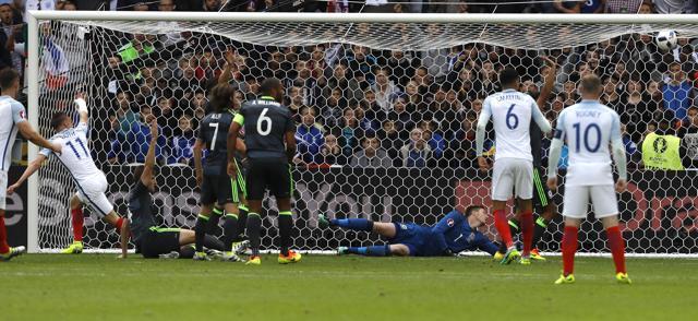 Vardy (# 11) sets off to celebrate after scoring England’s equaliser. (AP) Vardy (# 11) sets off to celebrate after scoring England’s equaliser. (AP)
