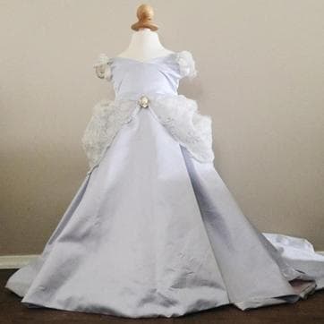 Relive the magic of Cinderella in this famous Disney inspired classic ball gown complete with a beautiful French lace! Just don’t forget to be home before the stroke of midnight! (littlebrightdress.com) Relive the magic of Cinderella in this famous Disney inspired classic ball gown complete with a beautiful French lace! Just don’t forget to be home before the stroke of midnight! (littlebrightdress.com)