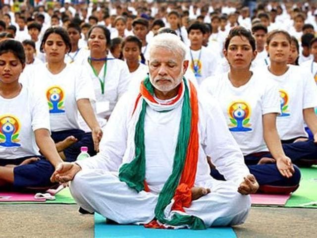 Prime Minister Narendra Modi had led over 35,000 people at the first International Day of Yoga at Rajpath, New Delhi, on June 21, 2015.(HT Photo)