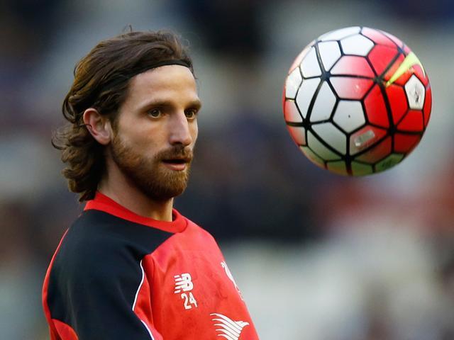 Joe Allen of Wales goes for the Jesus look. Joe Allen of Wales goes for the Jesus look.