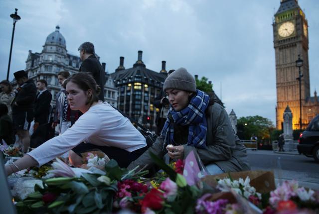At a vigil in Parliament square in London on Thursday. (AFP) At a vigil in Parliament square in London on Thursday. (AFP)