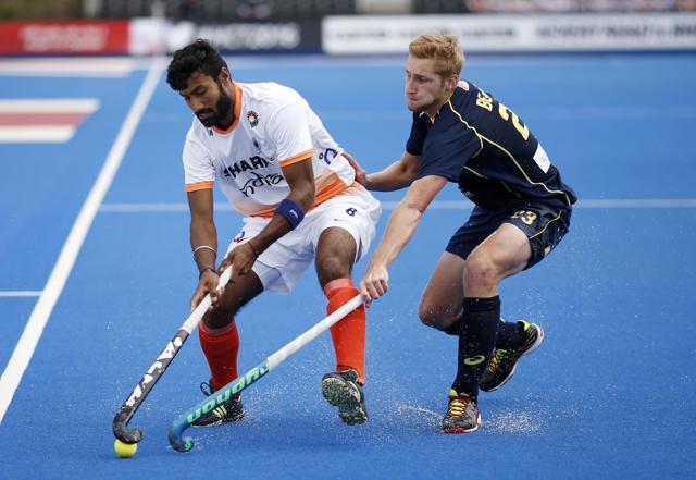 Indian hopes of qualifying for maiden Champions Trophy final was hanging by a thread after they lost 2-4 to Australia in their last round-robin match.(AP Photo)