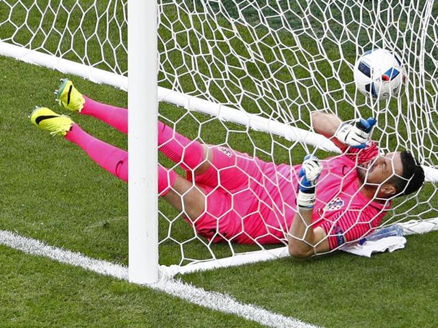 Croatia's Danijel Subasic falls into the goal after Milan Skoda (not pictured) scores. (REUTERS)