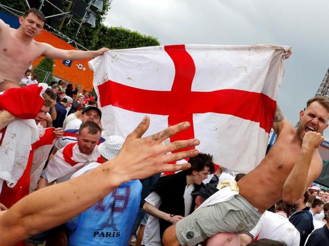 England fans react after their team won against Wales. (REUTERS photo) England fans react after their team won against Wales. (REUTERS photo)