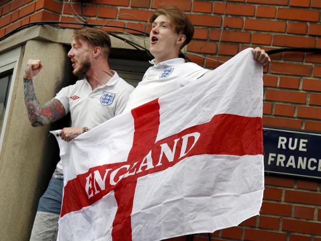 England fans celebrate the win near the stadium. (REUTERS)