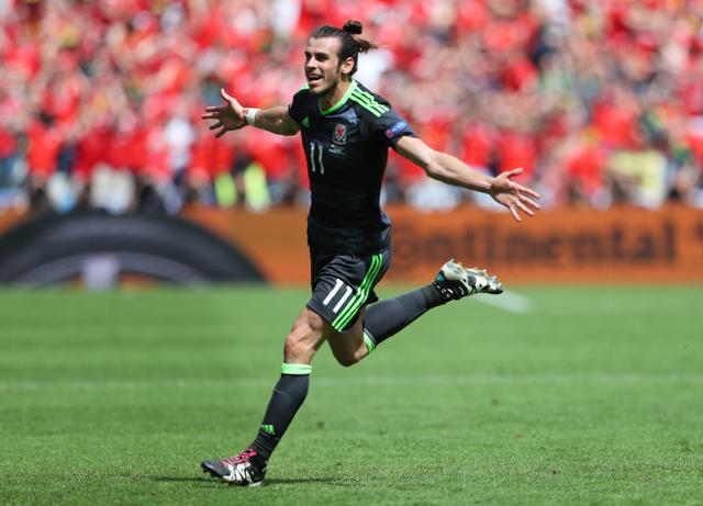 Wales' Gareth Bale celebrates after scoring their first goal. (Reuters Photo) Wales' Gareth Bale celebrates after scoring their first goal. (Reuters Photo)
