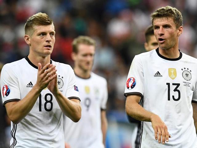 Germany's midfielder Mesut Oezil (L) vies for the ball against Poland's midfielder Tomasz Jodlowiec. (AFP Photo) Germany's midfielder Mesut Oezil (L) vies for the ball against Poland's midfielder Tomasz Jodlowiec. (AFP Photo)
