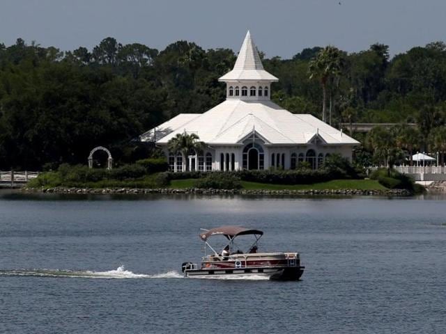 Florida Fish and Wildlife and an Orange County Sheriffs helicopter search for a young boy early on June 15 after he was dragged into the water by an alligator at Walt Disney World Resort in Orlando. Lane Graves’ body resurfaced later, intact. (AP) Florida Fish and Wildlife and an Orange County Sheriffs helicopter search for a young boy early on June 15 after he was dragged into the water by an alligator at Walt Disney World Resort in Orlando. Lane Graves’ body resurfaced later, intact. (AP)