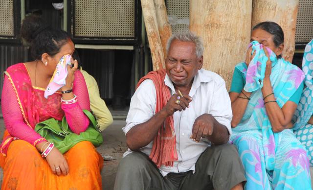 Relatives of Kailas Dhobi, convicted in connection with a riot in Gujarat in 2002, cries after the verdict. (Siddharaj Solanki/Hindustan Times)