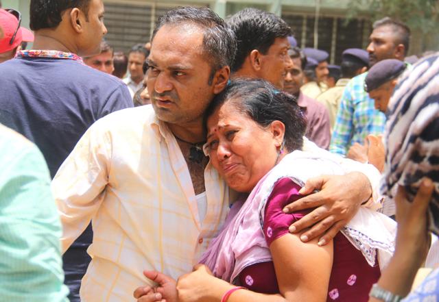 Relatives of a Lakhan Chudasma, convicted in connection with a riot in Gujarat in 2002, cry outside a court after the sentencing in Ahmedabad. (Siddharaj Solanki/HindustanTimes)