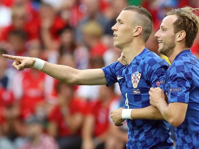 Croatia's Ivan Perisic, left, celebrates with teammate Ivan Rakitic after scoring. (AP)