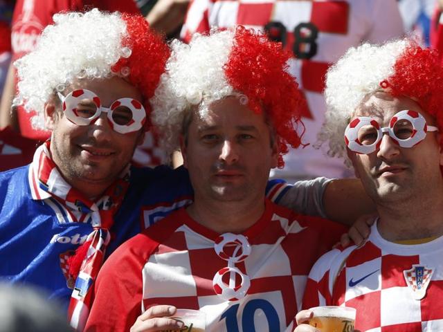 Croatia team's fans cheer prior to the Euro 2016 Group D football match between the Czech Republic and Croatia at the Geoffroy Guichard stadium in Saint-Etienne, France. (AP Photo)