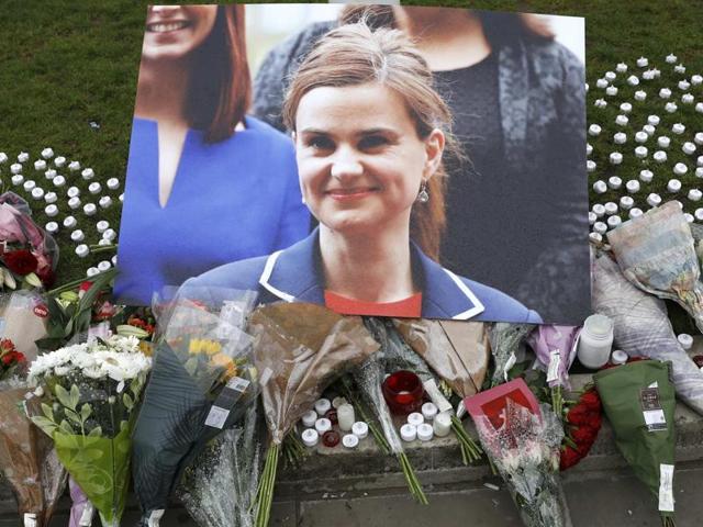 Tributes and candles left for murdered Labour Member of Parliament Jo Cox are seen in Parliament Square, London, Britain June 17, 2016 REUTERS/Stefan Wermuth (Reuters) Tributes and candles left for murdered Labour Member of Parliament Jo Cox are seen in Parliament Square, London, Britain June 17, 2016 REUTERS/Stefan Wermuth (Reuters)
