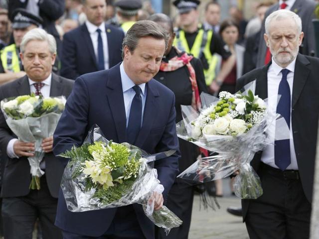 London : An image and floral tributes for Jo Cox, the British MP shot to death in northern England on Thursday, lie placed in Parliament Square outside the House of Parliament in London on Friday. (AP) London : An image and floral tributes for Jo Cox, the British MP shot to death in northern England on Thursday, lie placed in Parliament Square outside the House of Parliament in London on Friday. (AP)