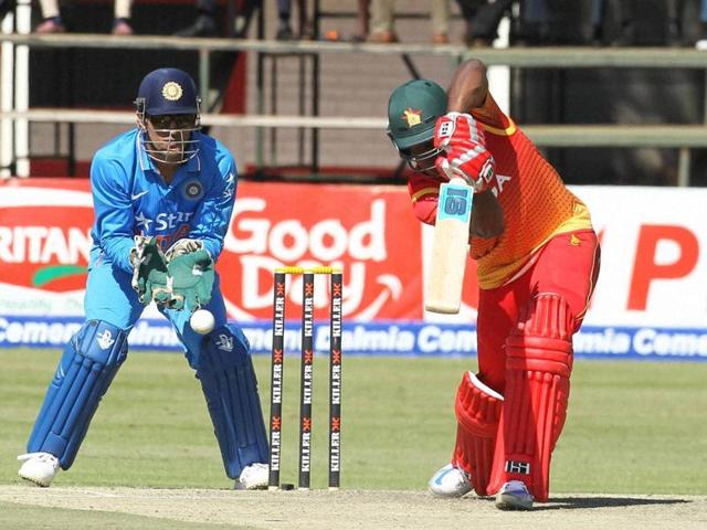 Zimbabwean batsman Vusimusi Sibanda, right, plays a shot next to Indian wicket keeper MS Dhoni. (AP Photo) Zimbabwean batsman Vusimusi Sibanda, right, plays a shot next to Indian wicket keeper MS Dhoni. (AP Photo)