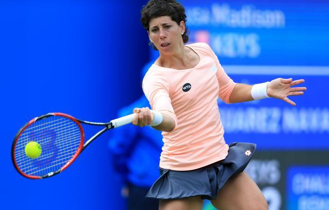 Carla Suarez Navarro returns a shot to Madison Keys. (AP) Carla Suarez Navarro returns a shot to Madison Keys. (AP)