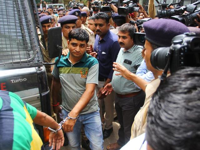 Convicts in the 2002 Gulberg Society massacre case arrive in a police vehicle for the pronouncement of their sentence on Friday, June 17, 2016. (Siddharaj Solanki/HT Photo) Convicts in the 2002 Gulberg Society massacre case arrive in a police vehicle for the pronouncement of their sentence on Friday, June 17, 2016. (Siddharaj Solanki/HT Photo)