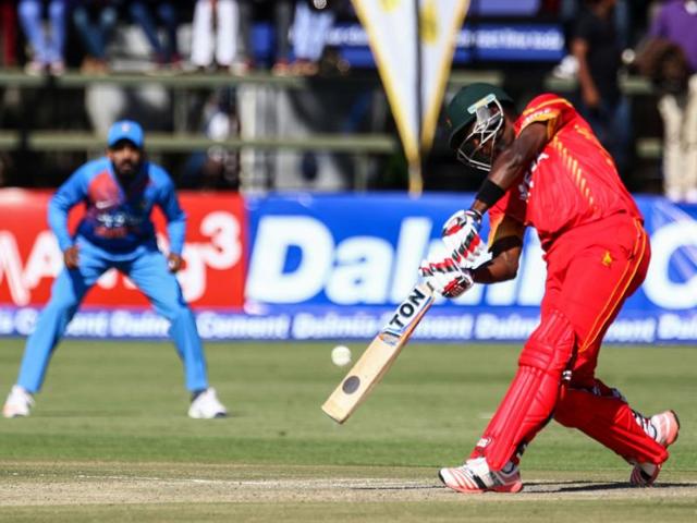 Zimbabwe's Elton Chigumbura hit 54 off 26 balls to help his team post 170/6. (AFP) Zimbabwe's Elton Chigumbura hit 54 off 26 balls to help his team post 170/6. (AFP)