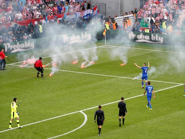 Turkey supporters also lit flares in the stadium during the match against Spain.(AFP)