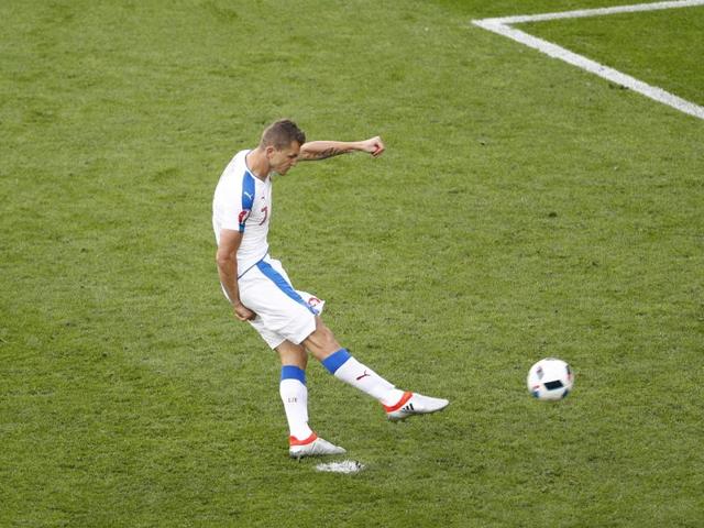 Czech Republic's Tomas Necid scores his side’s equaliser from the penalty spot. (REUTERS)