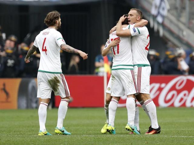 Birkir Saevarsson, on the ground, reacts after scoring an own goal and Hungary's first as Daniel Bode celebrates. (Reuters) Birkir Saevarsson, on the ground, reacts after scoring an own goal and Hungary's first as Daniel Bode celebrates. (Reuters)