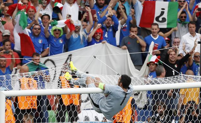 Gianluigi Buffon celebrates on the cross bar after the match. (REUTERS) Gianluigi Buffon celebrates on the cross bar after the match. (REUTERS)