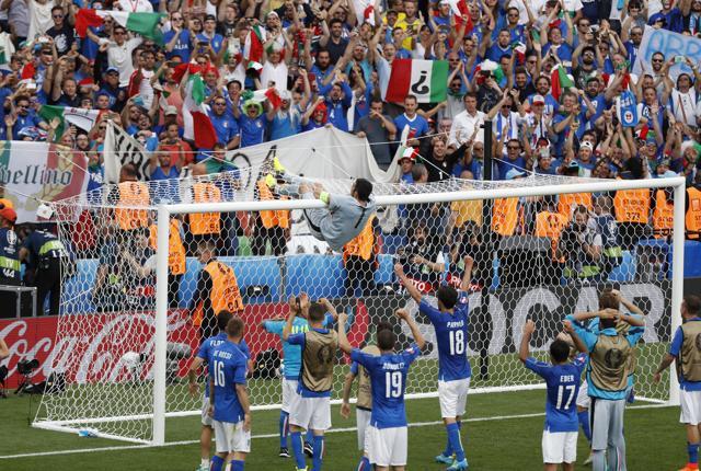 Gianluigi Buffon celebrates on the cross bar as teammates rejoice after the win over Sweden. (REUTERS) Gianluigi Buffon celebrates on the cross bar as teammates rejoice after the win over Sweden. (REUTERS)
