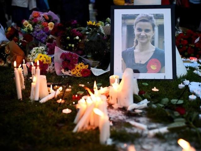 Candles are lit around floral tributes in Parliament Square central London in remembrance of Labour MP Jo Cox who was killed on a street in Birstall on June 16. (AFP) Candles are lit around floral tributes in Parliament Square central London in remembrance of Labour MP Jo Cox who was killed on a street in Birstall on June 16. (AFP)